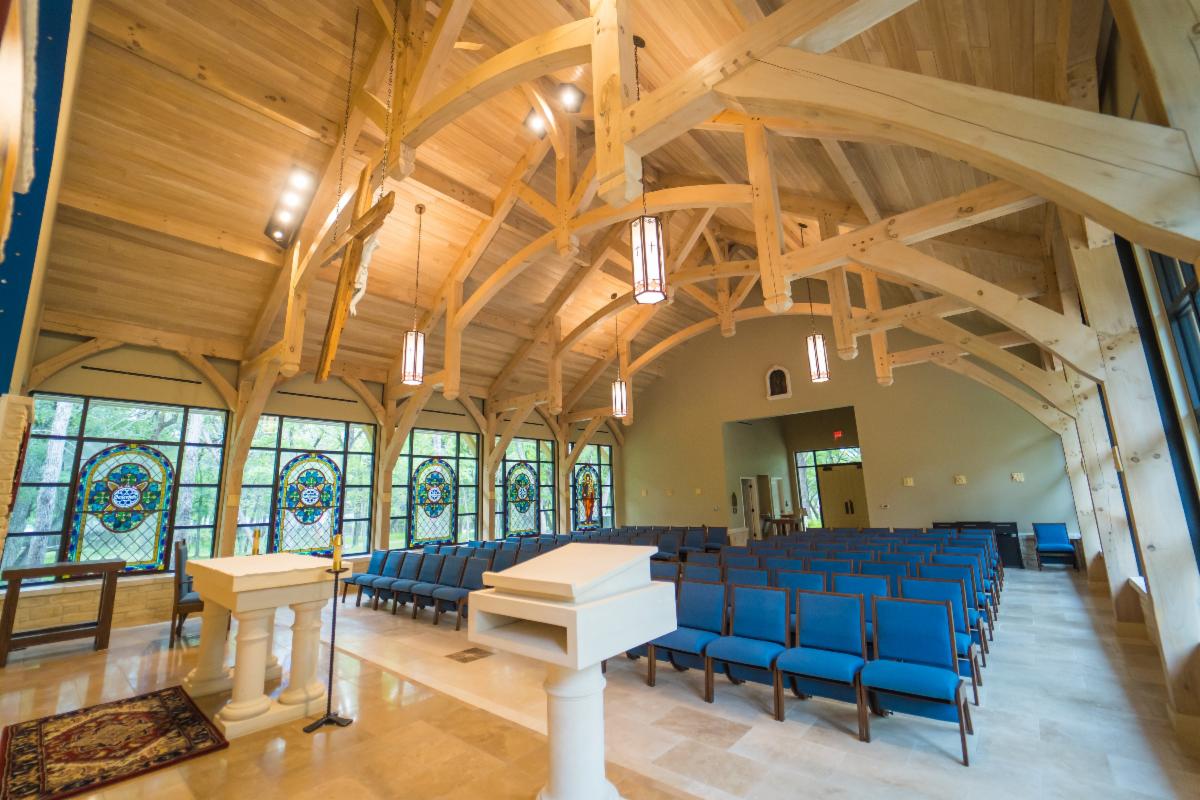 Timber trusses and rafters carrying the chapel roof