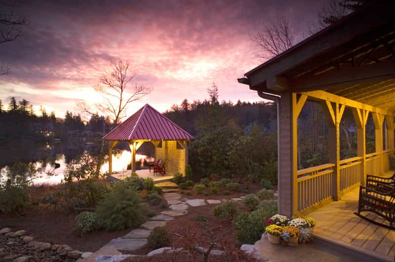 Lakeside timber-frame gazebo at sunset, Jackson family home