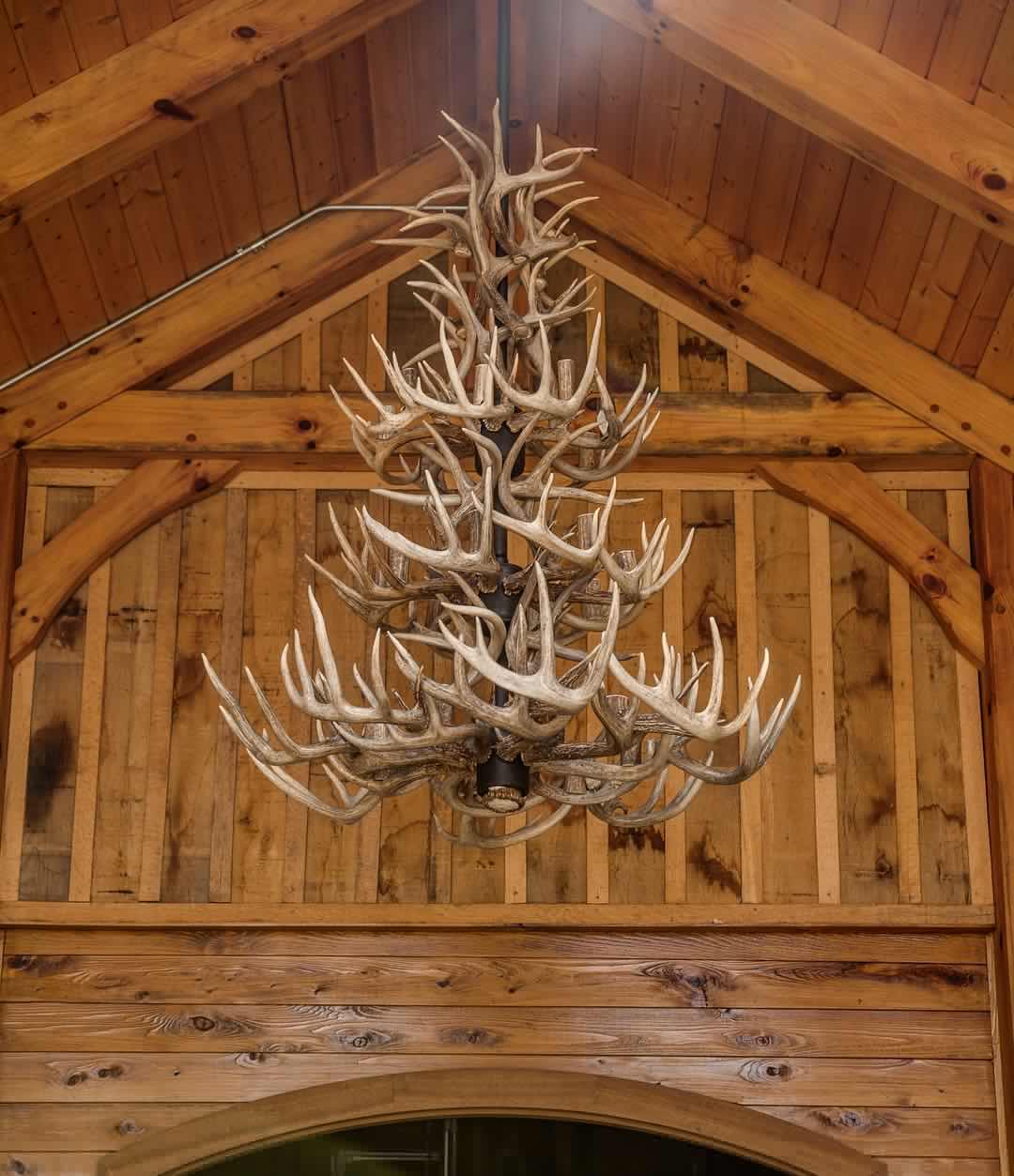Antler chandelier hung in the gable of the tasting room
