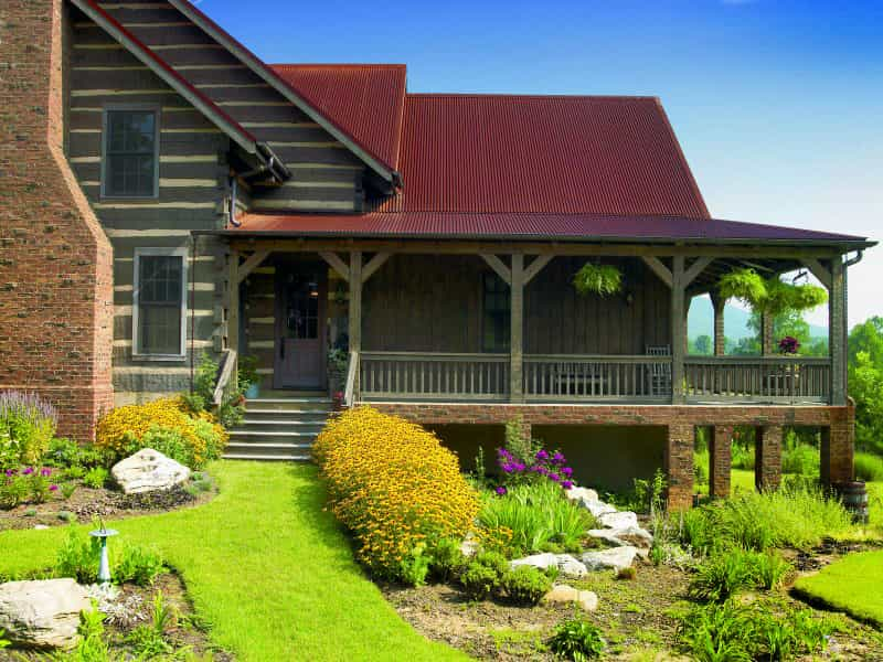 The Green Family Log Home — hand-hewn logs, aged interior finishes, Tennessee