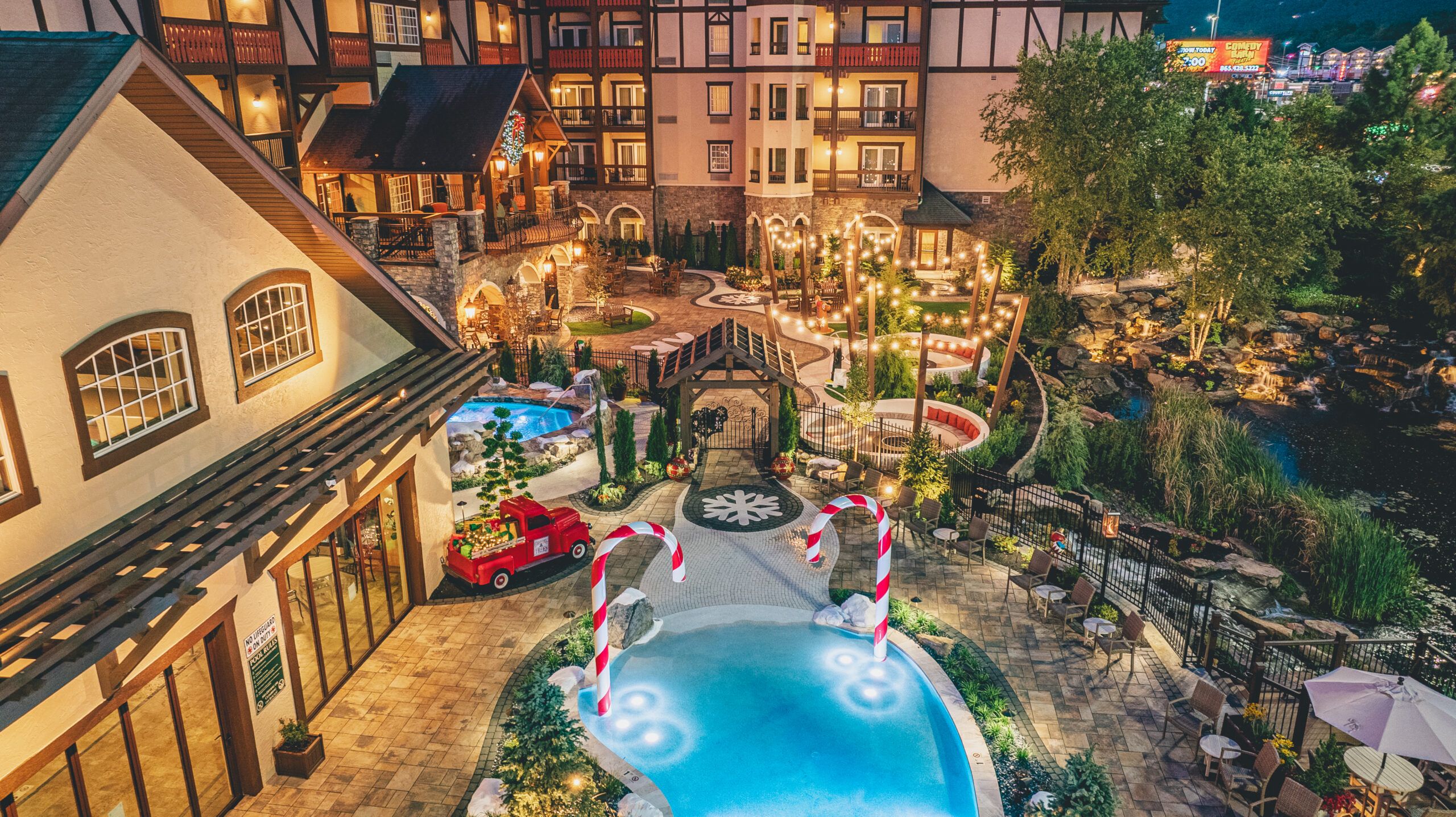 Aerial view of the alpine rooflines and timber gables at The Inn at Christmas Place